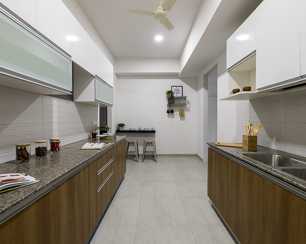 Modular kitchen with granite counters in the sample apartment (actual image)