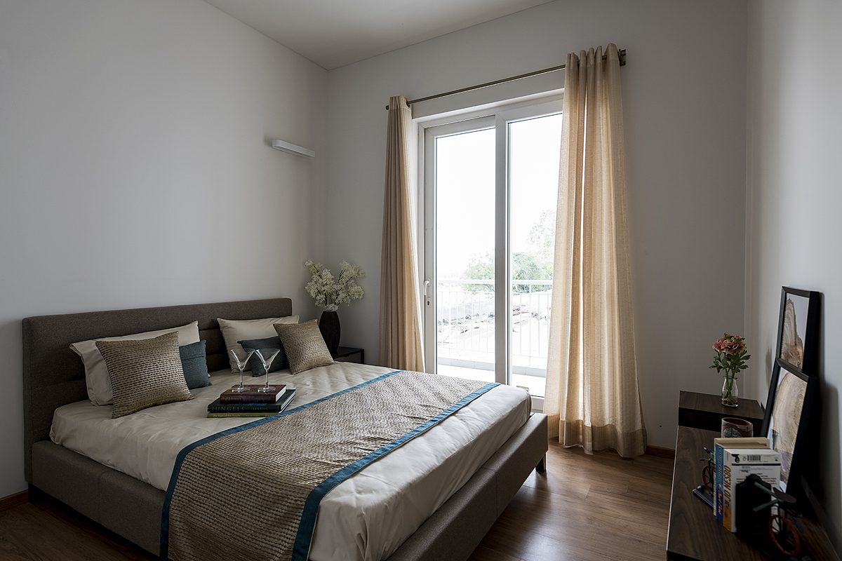 Wooden flooring in a bedroom of the sample apartment (actual image)